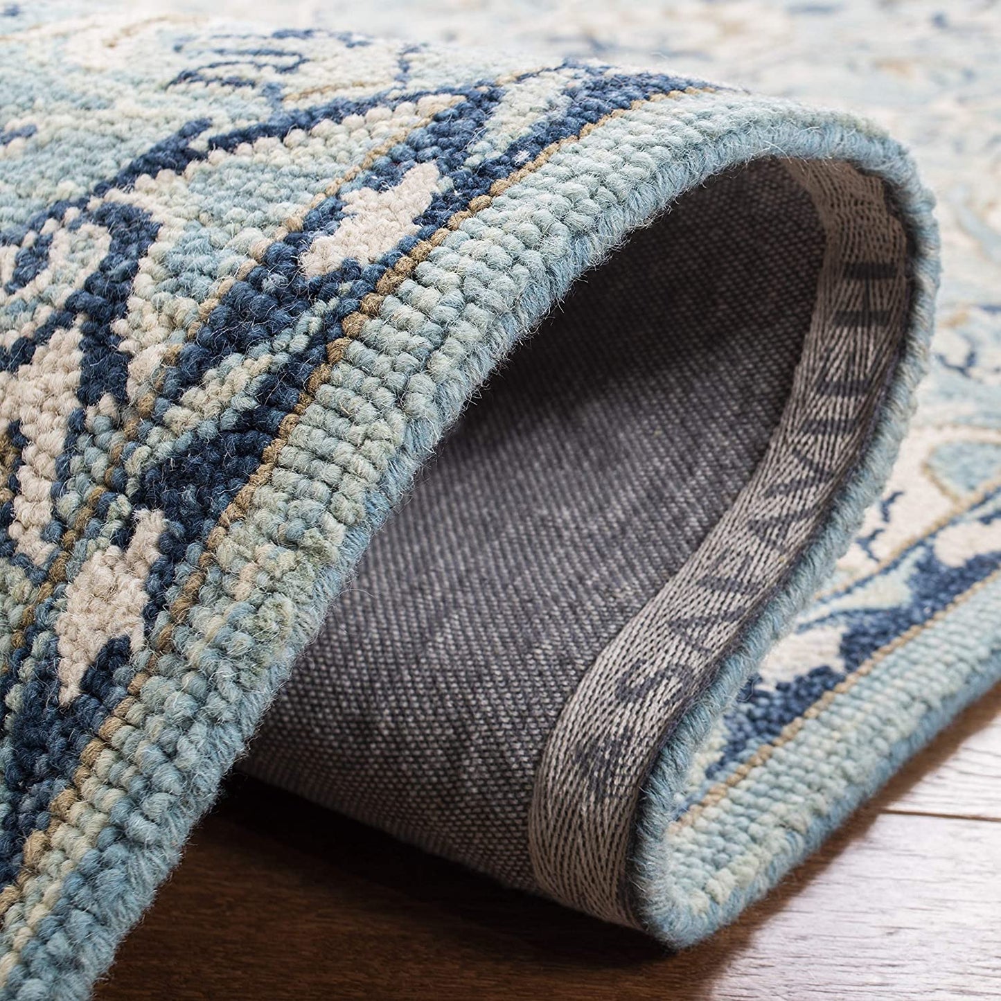 Blossom Collection Handmade Tassel Premium Wool Accent Rug Blue / Ivory