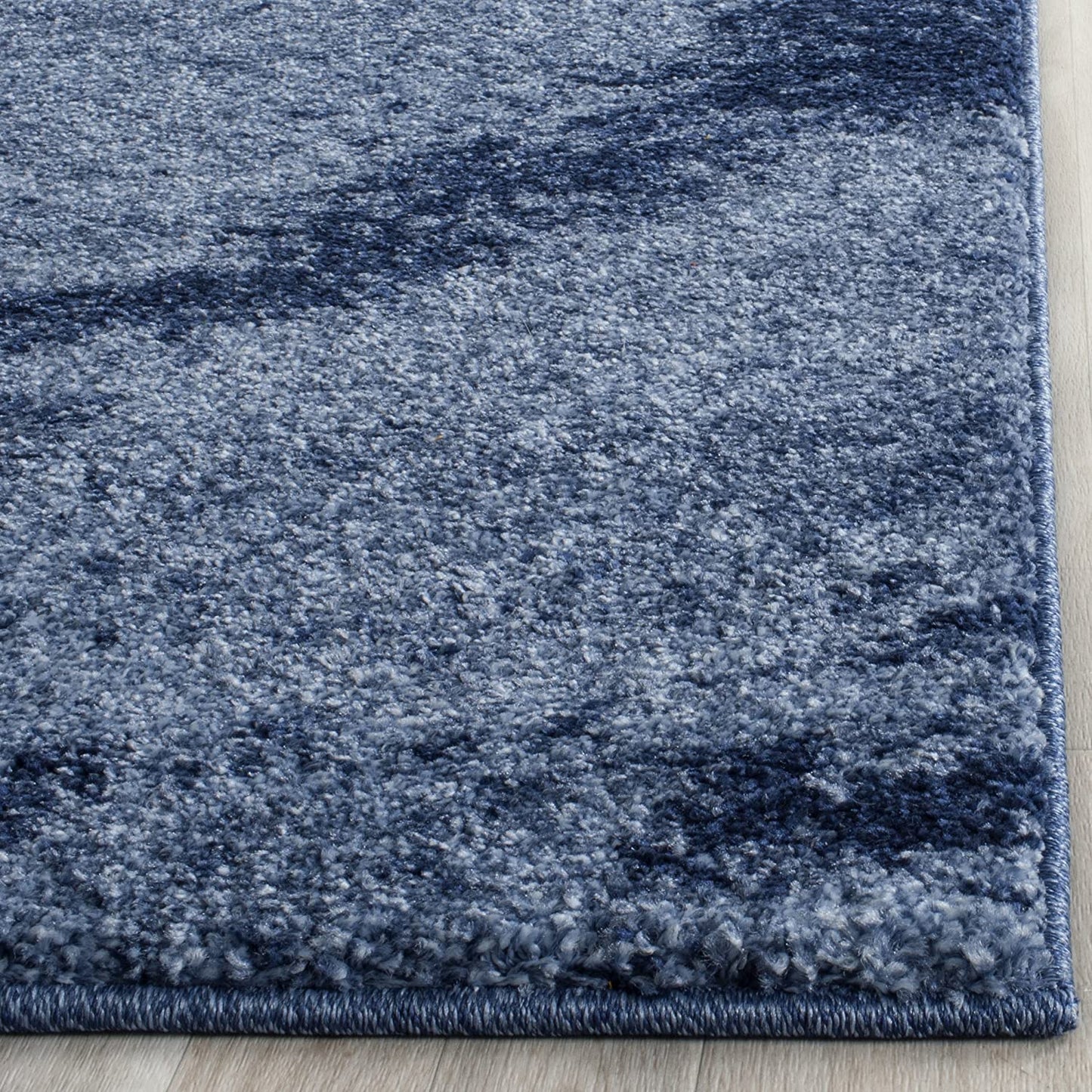 Modern Abstract Light Blue and Blue Area Rug