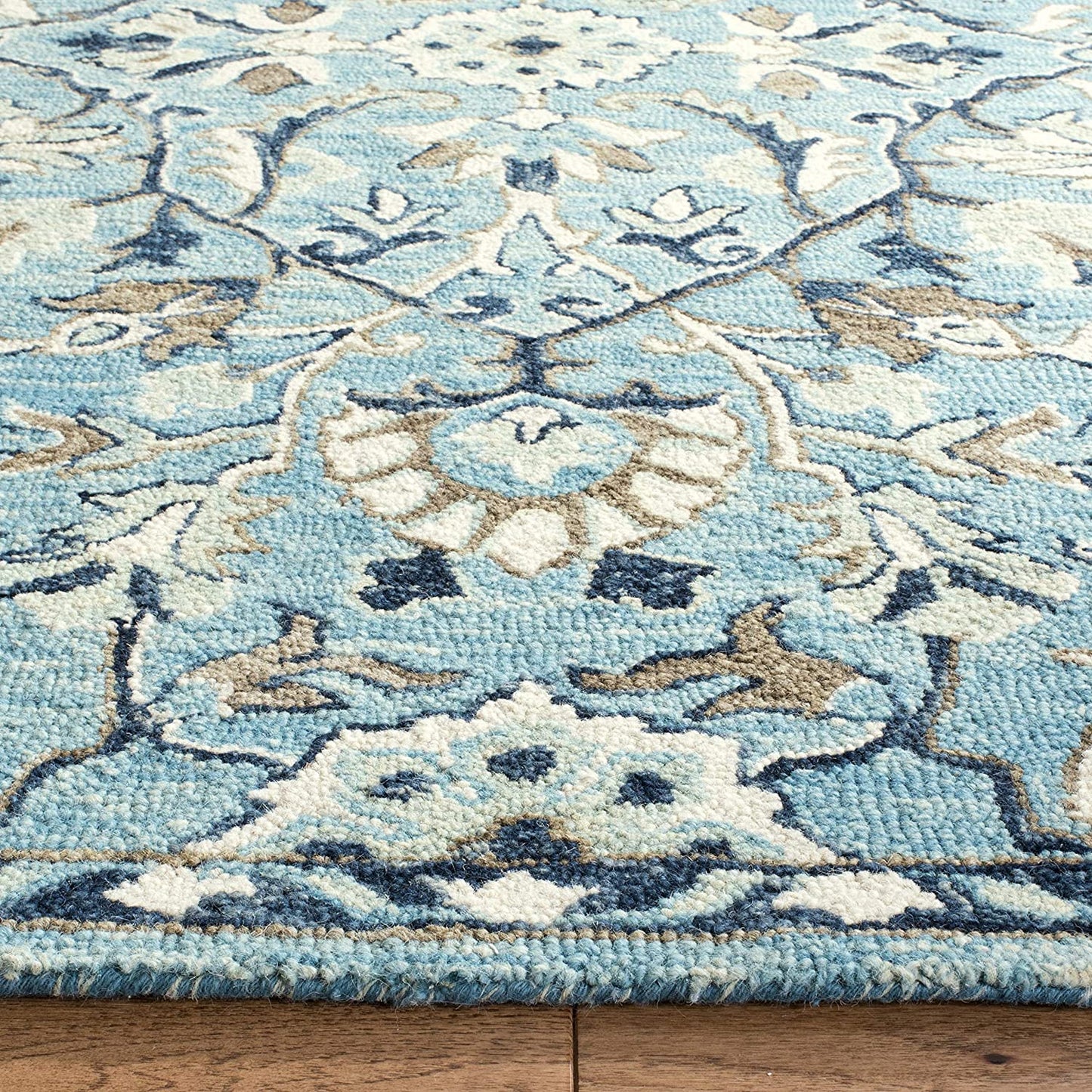 Blossom Collection Handmade Tassel Premium Wool Accent Rug Blue / Ivory