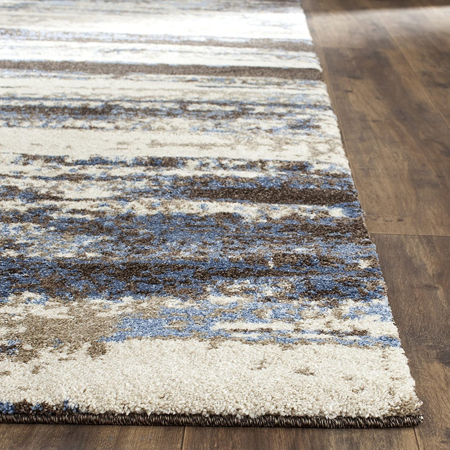 Cream and Blue Modern Abstract Area Rug