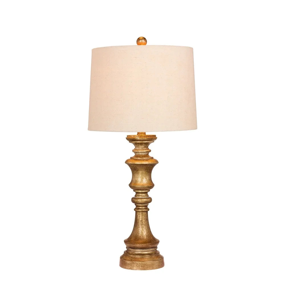 Fangio Lighting's 6236AG 27.75 in. Candlestick Resin Table Lamp in a Antiqued Gold Leaf Finish