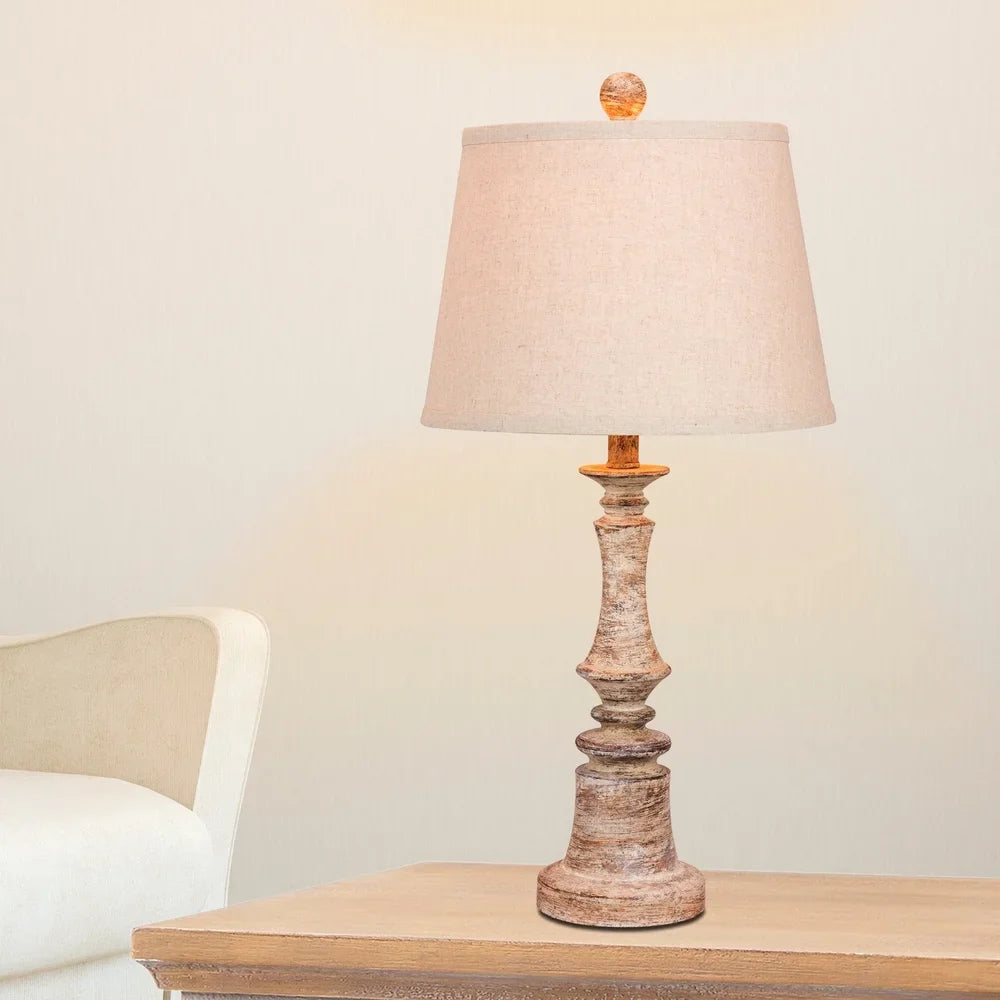 Fangio Lighting's 6240CABG 26.5 in. Distressed Candlestick Resin Table Lamp in a Cottage Antique Beige Finish