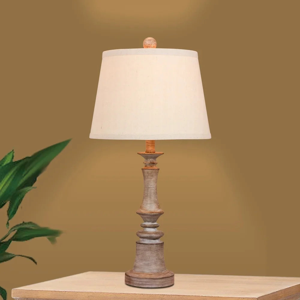 Fangio Lighting's 6240CWG 26.5 in. Candlestick Resin Table Lamp in a Cottage Weathered Gray Finish