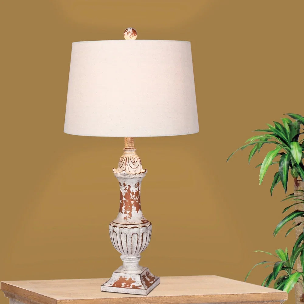 Fangio Lighting's #6245AM 29.5 in. Distressed Decorative Urn Resin Table Lamp in Antique Metallic