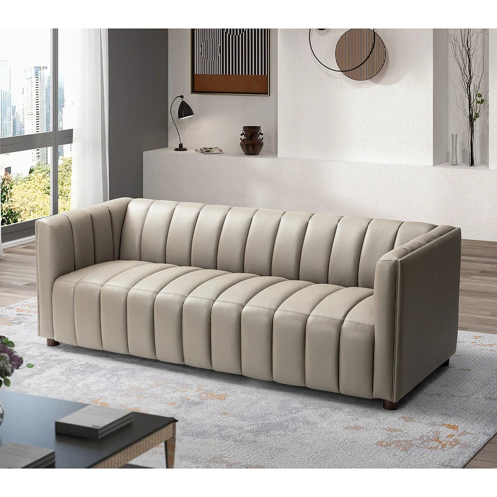 Olinto Modern Camel 83-inch Genuine Leather Curved Couch with Channel-tufted Back